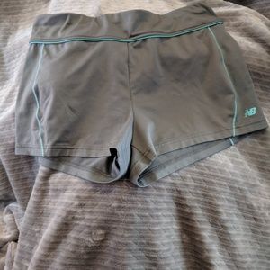 New Balance poly/spandex athletic shorts